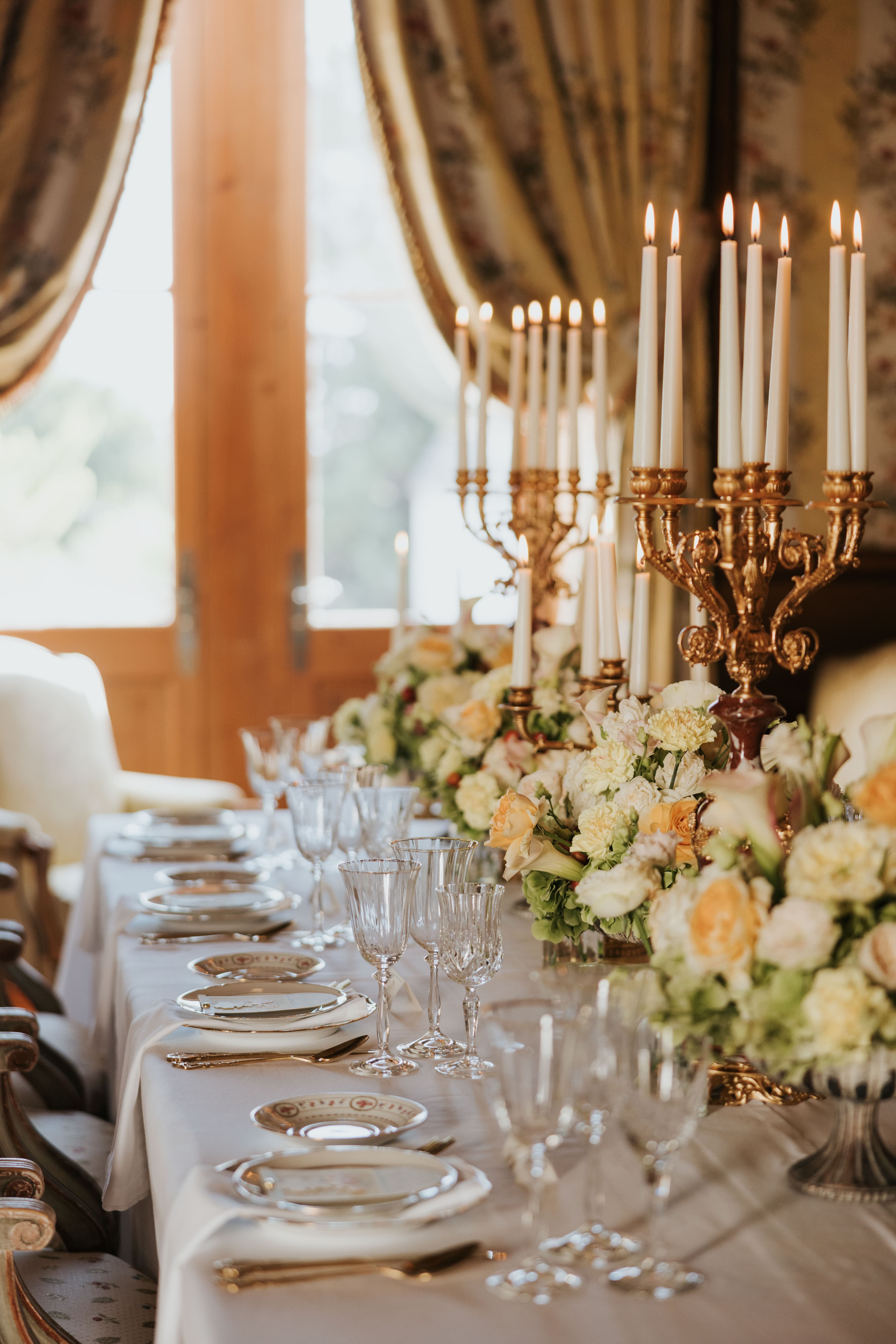 Long chateau dinner table with candelabras