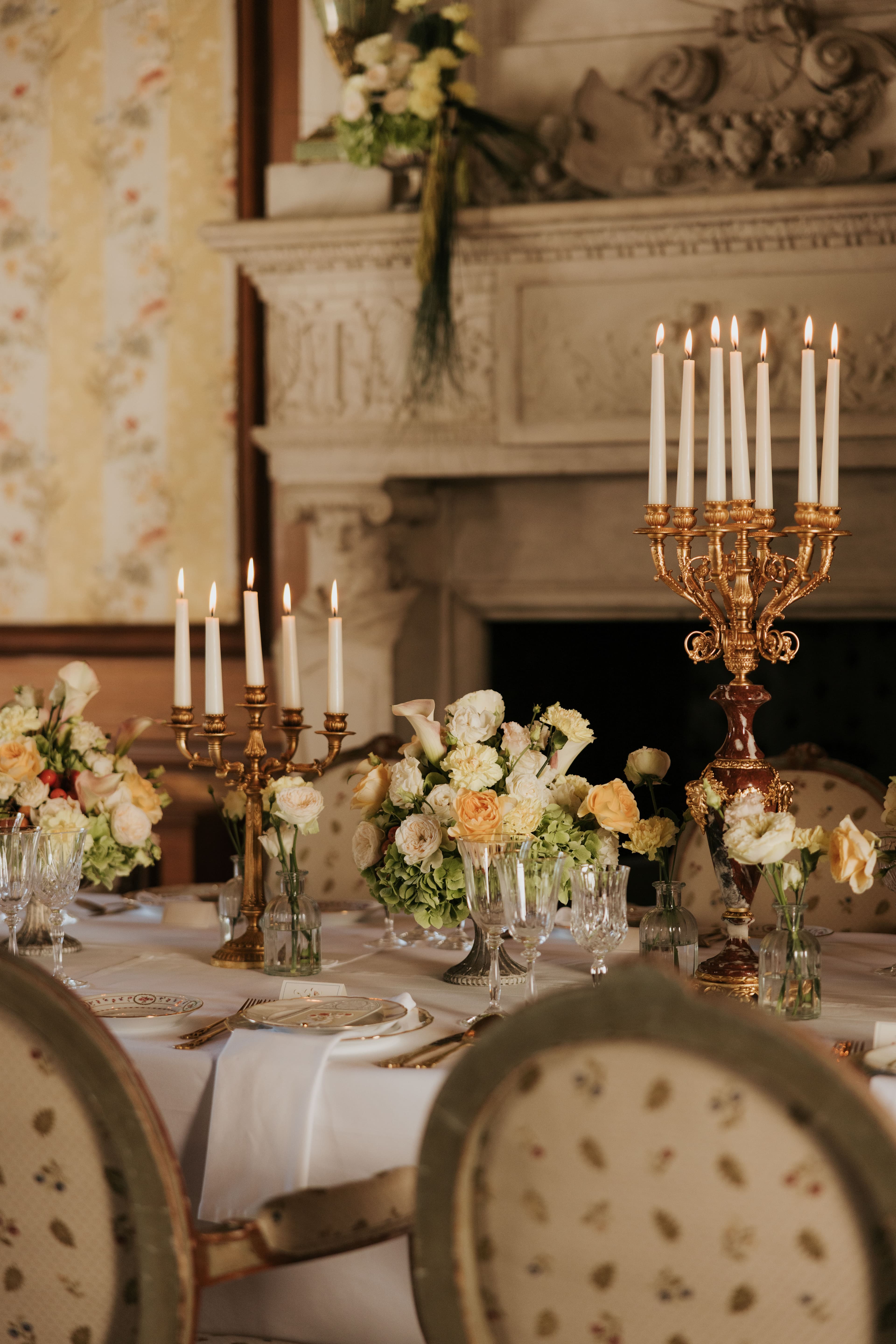 Round chateau table set for dinner
