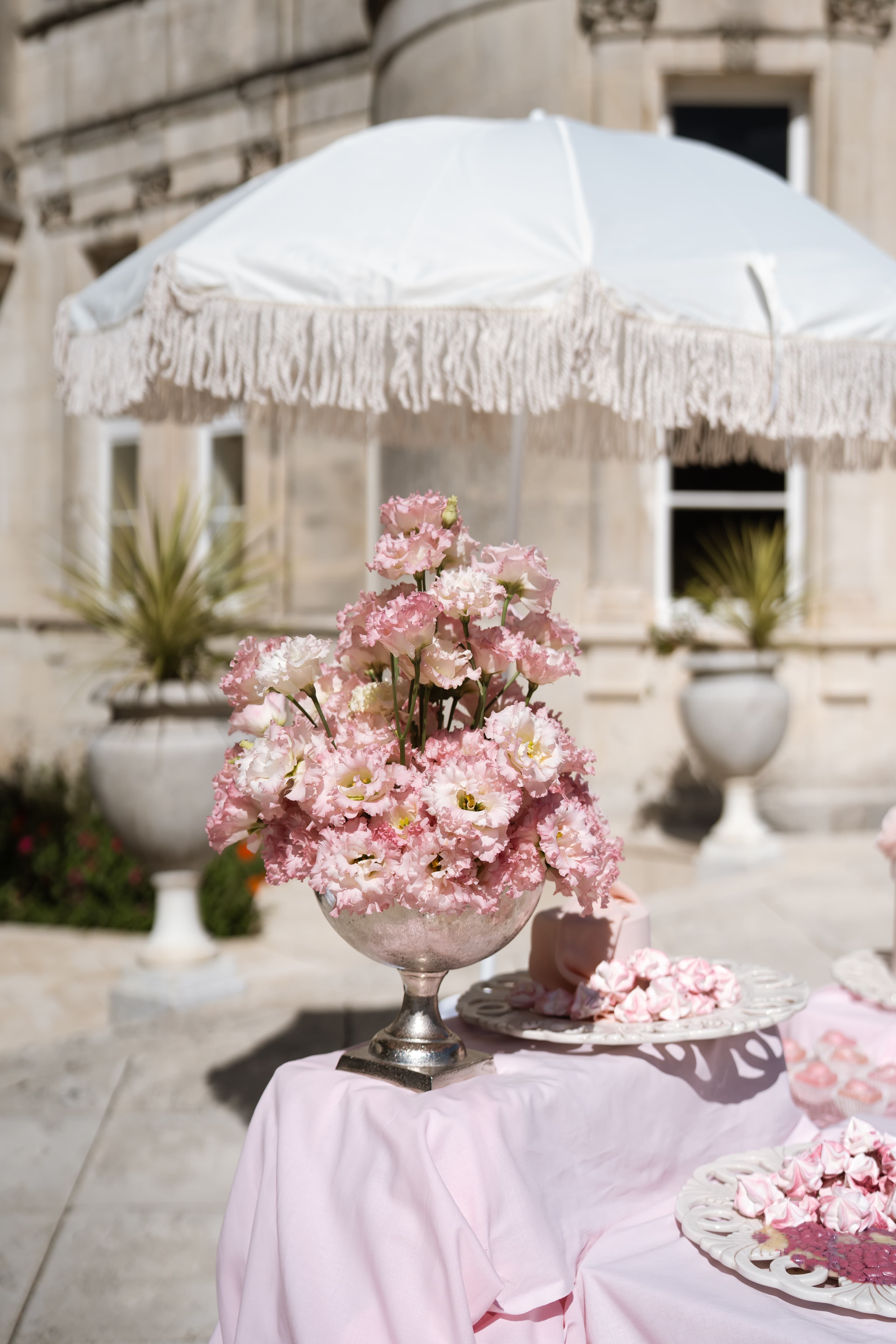 Pink florals in a silver urn