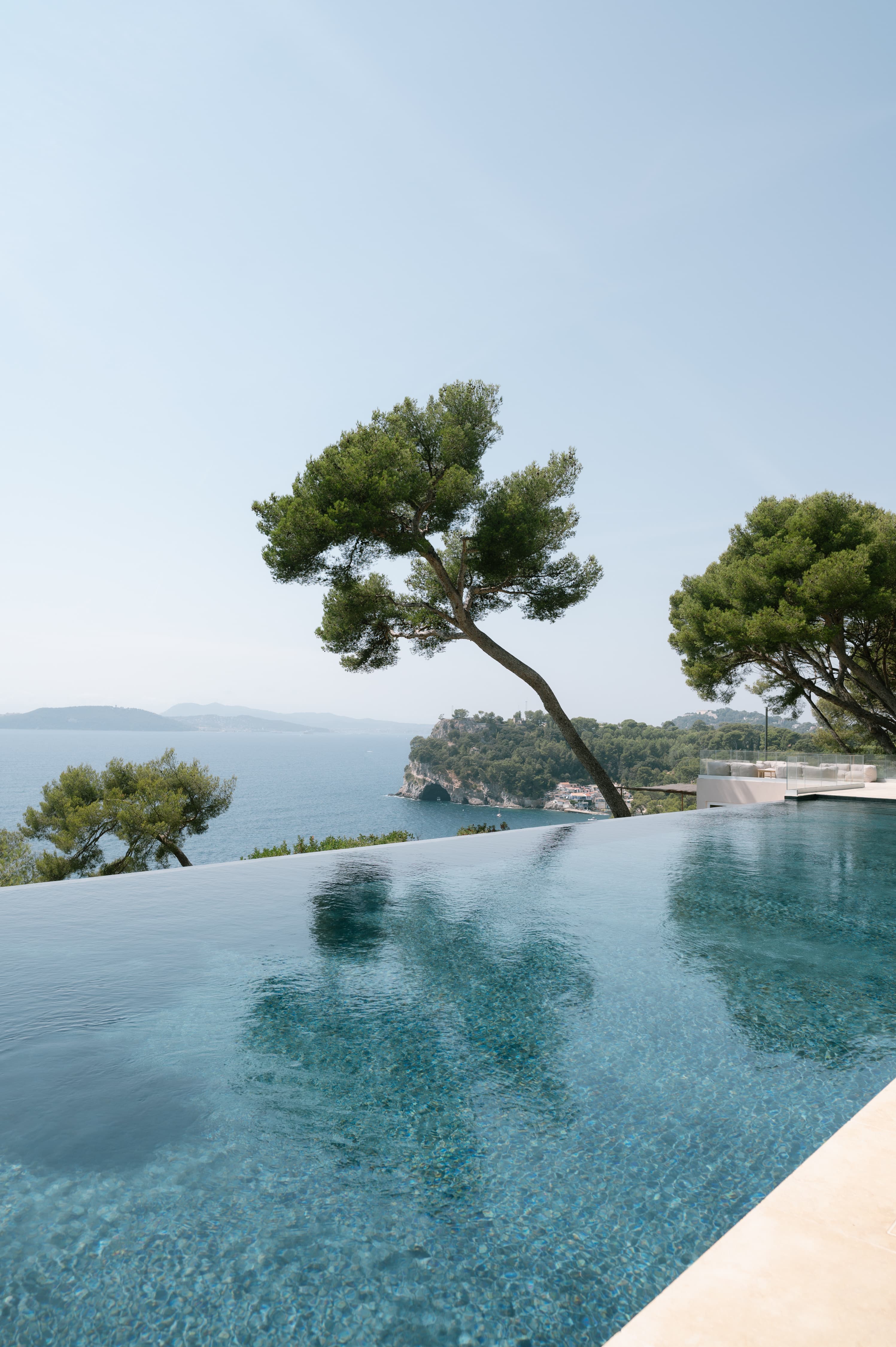 An infinity pool with a sea view